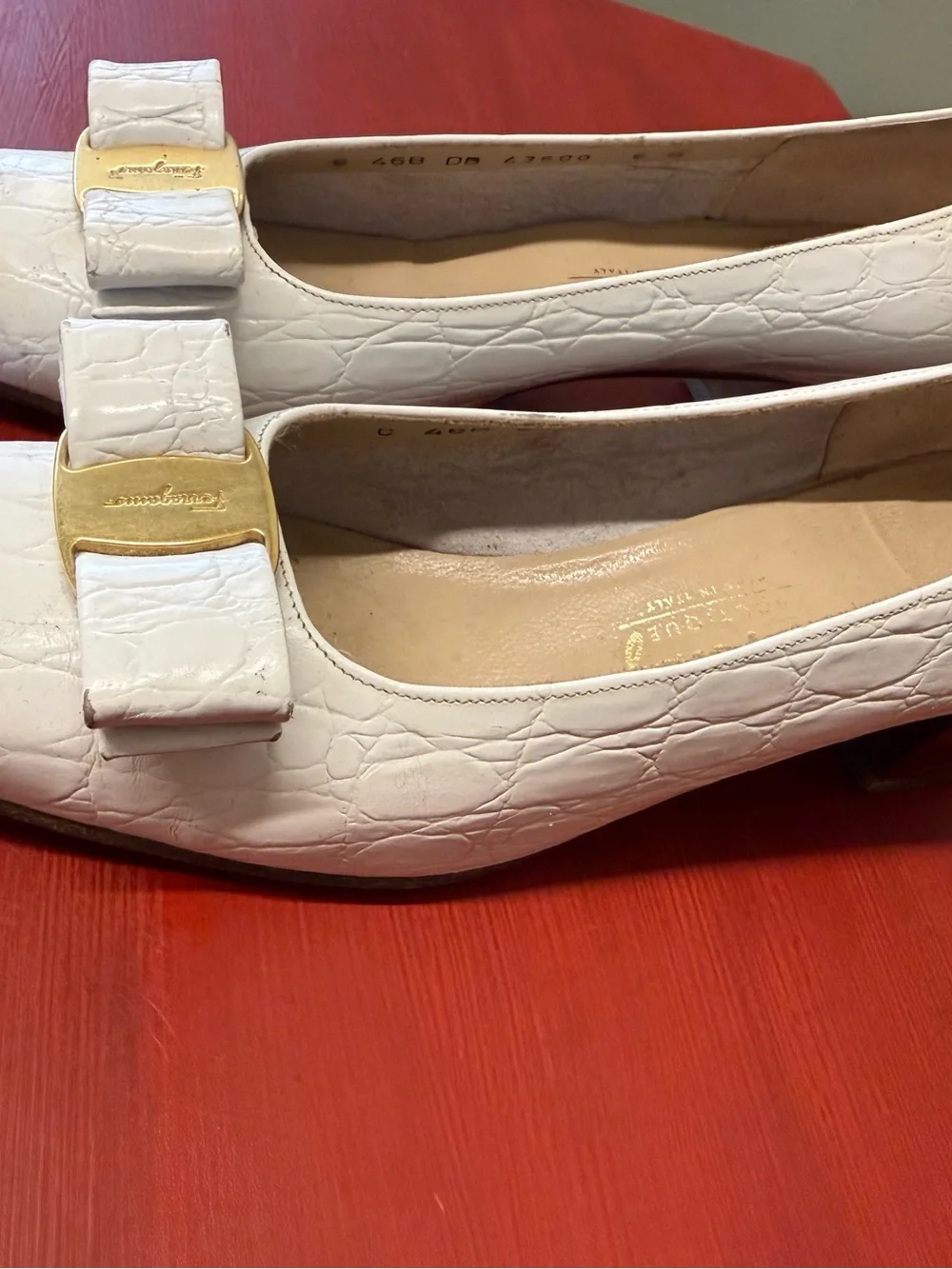 Salvatore Ferragamo White Leather Vara Bow Flats with Gold Accent